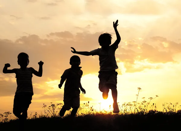 depositphotos_10422464-stock-photo-children-running-on-meadow-at